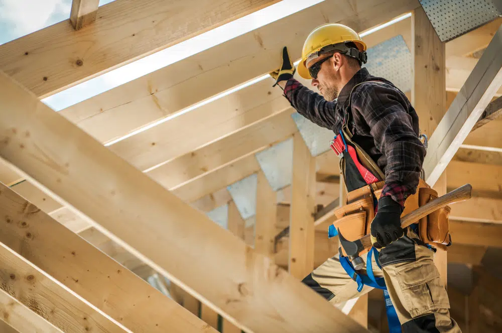 Construction,Worker,On,Duty.,Caucasian,Contractor,And,The,Wooden,House suicide provention month
